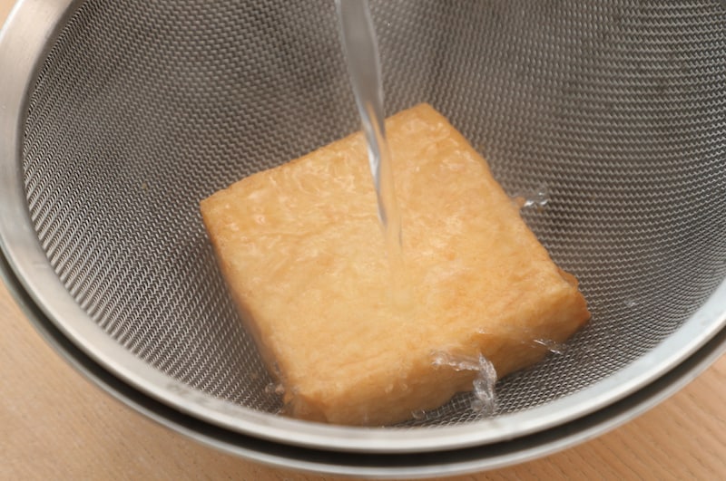 写真：熱湯を回しかける